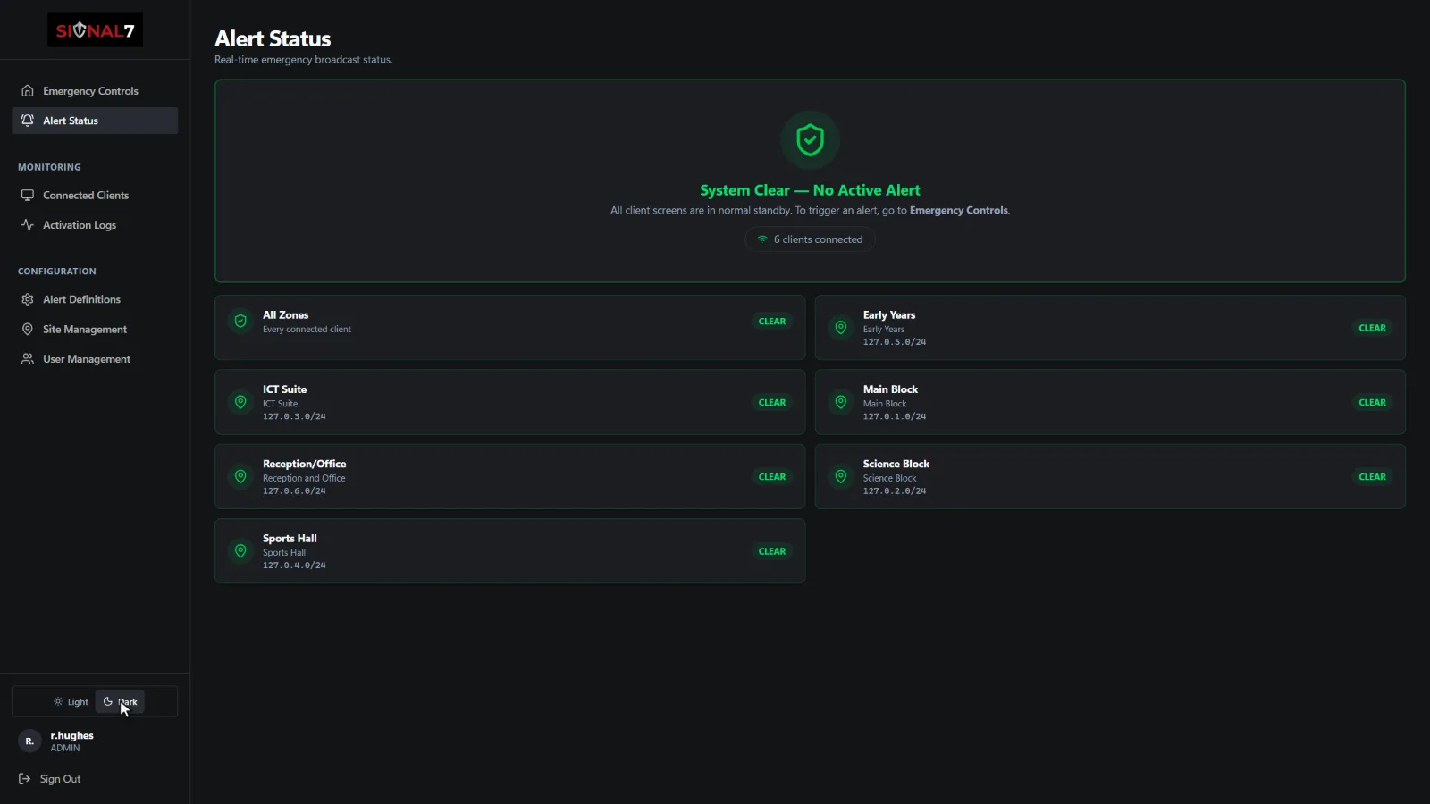 The Signal 7 Alert Status screen in dark mode: the green System Clear — No Active Alert panel on a dark background, with six classroom PCs connected.